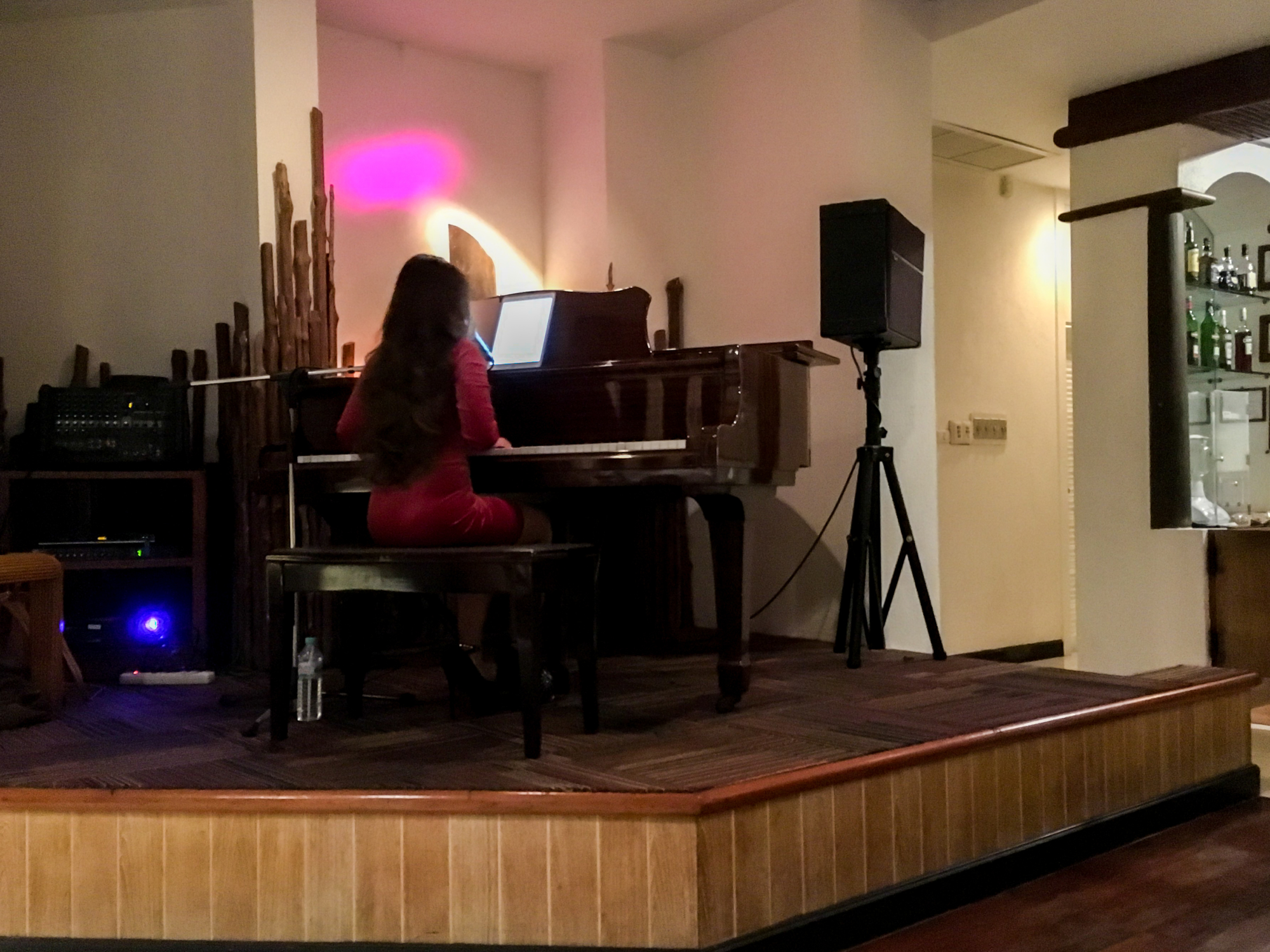 Live pianist in Otter's Bar at Cape Panwa Hotel, Phuket Thailand